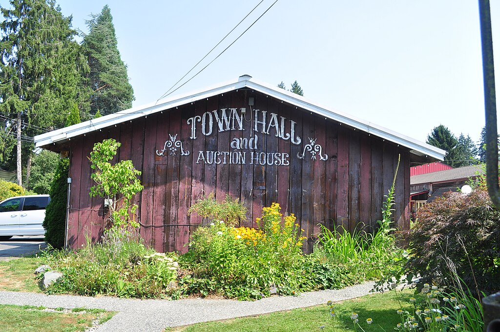Photo by Joe Mabel: https://commons.wikimedia.org/wiki/File:Bothell,_WA_-_Country_Village_17_-_Town_Hall_%26_Auction_House.jpg